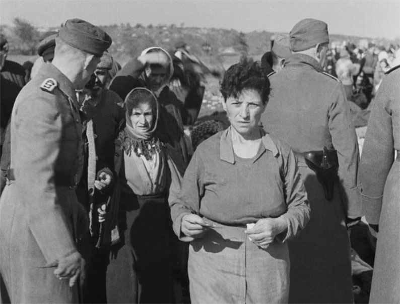 The Jews are rounded up by the occupying forces in Babi Yar. Context