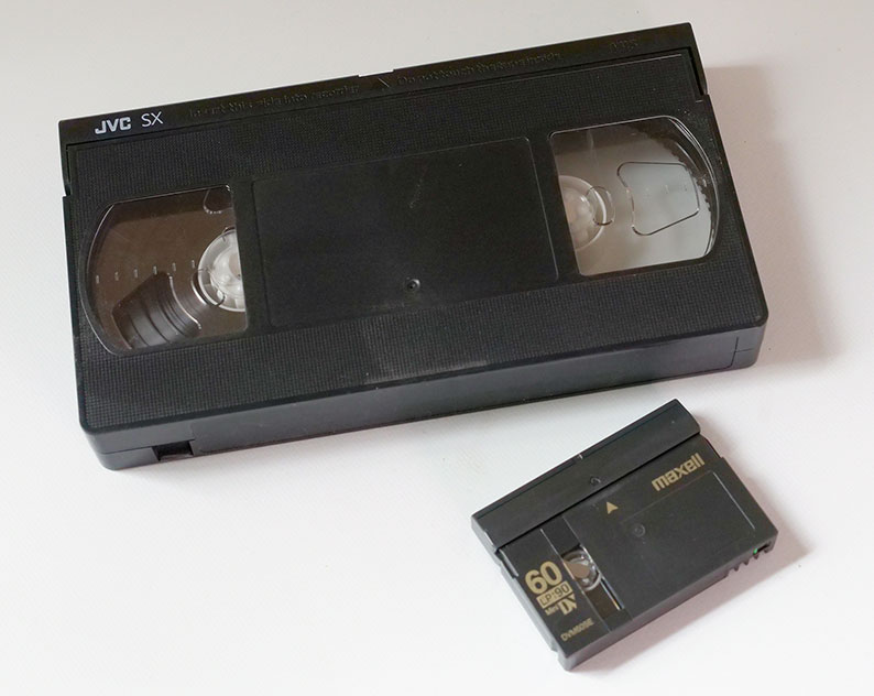 A DV tape compared to a VHS tape