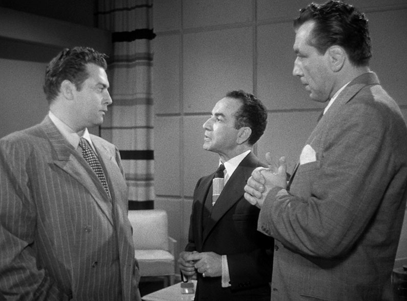 Kerric is reminded of his position by Little Guy DeCola and Hoppe