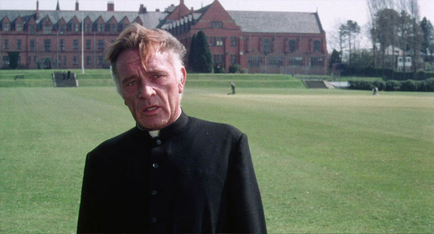 Richard Burton as Father  Goddard