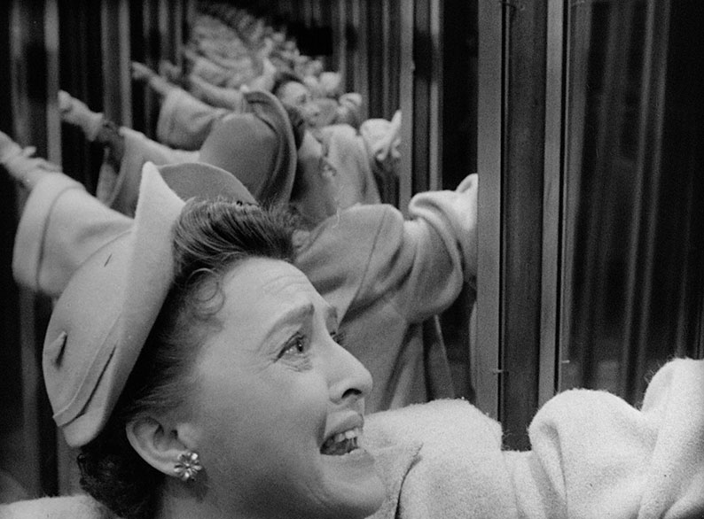Catherine panics in a hall of mirrors