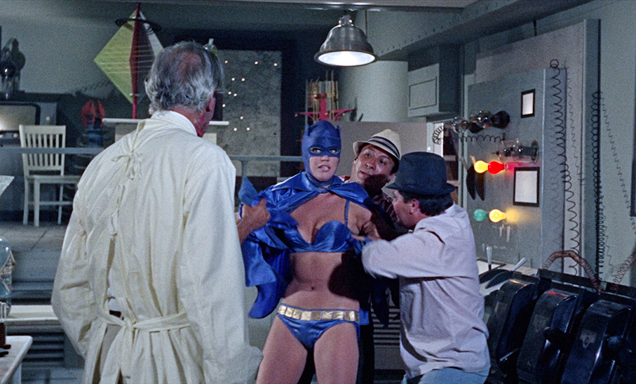 Dr. Williams' goons grab the Bat Woman