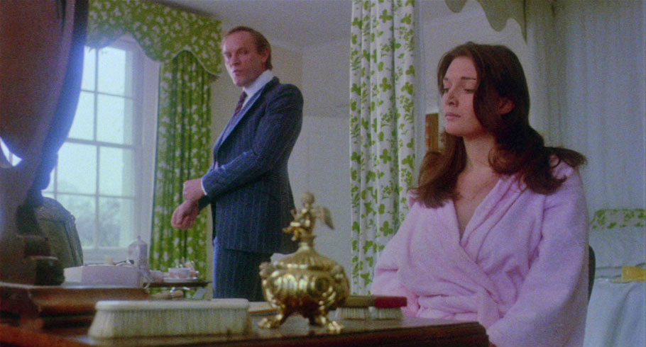 Julian Glover and Sarah Douglas in The Brute