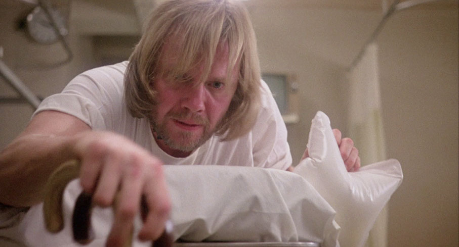 Luke pulls himself along in the VA hospital