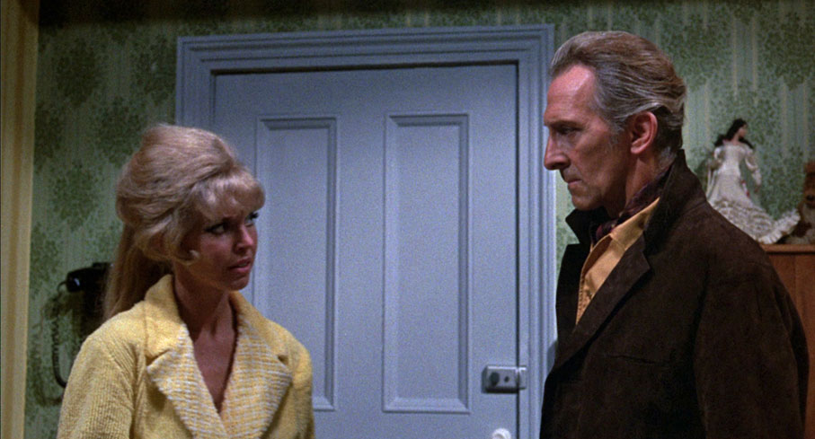 Marian Collins greets Peter Cushing as John in the Continental version