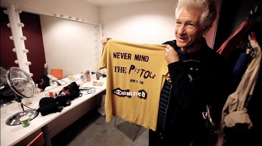 Captain Sensible shows off his t-shirt