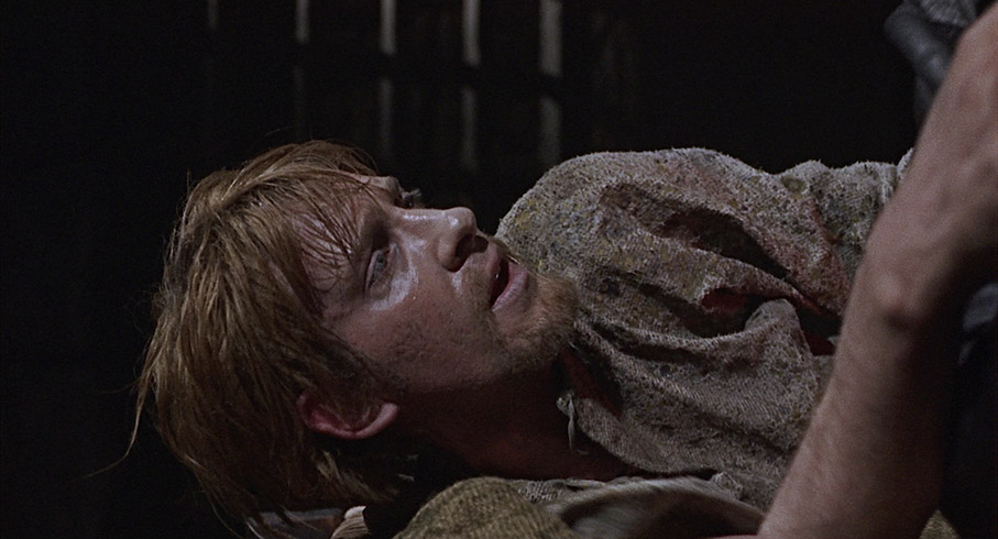 An uncredited David Warner as Marlowe's Edward II