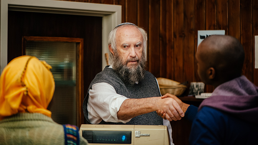 Jonathan Pryce as Nat