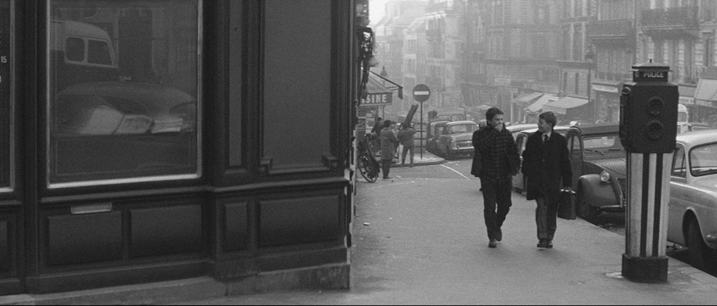 Antoine and friend on the streets of Paris