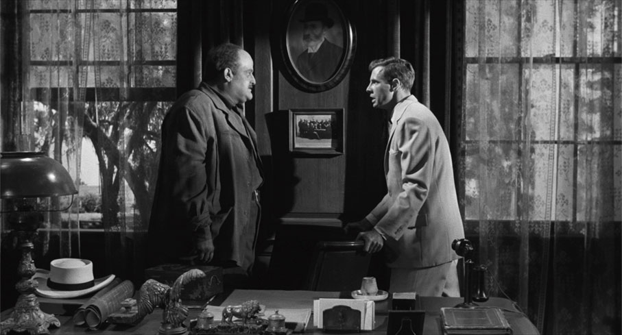 Big Sam Hollis confronts Jonathan in the film's prologue