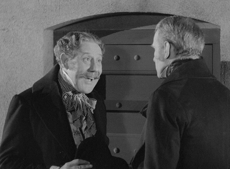 Squire John Meadows gleefully tells the Reverand Eden about the Black Hole