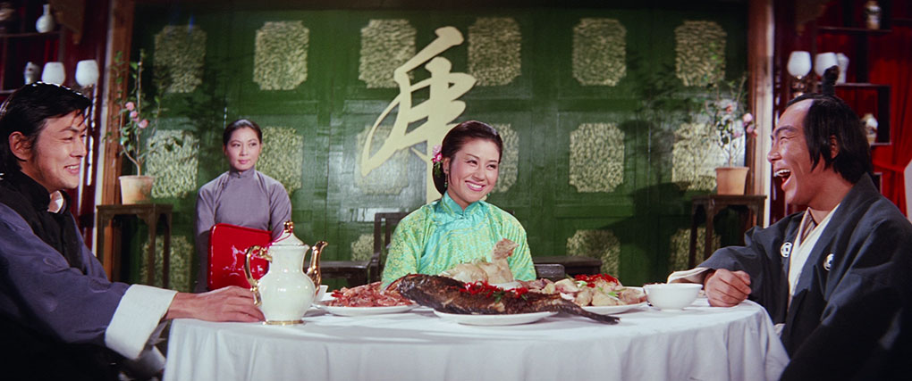 Tung Ku, Tiao Ta Niang and Ichiro Fumita share a meal