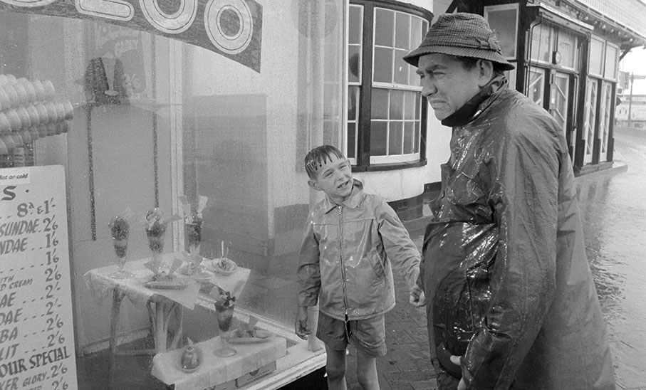 Wally and Peter battle a downpour