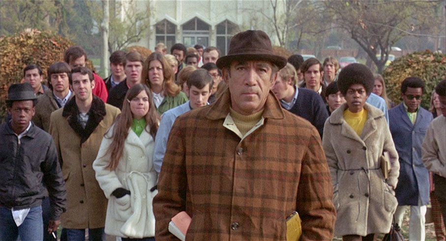 Paco approaches the administration building