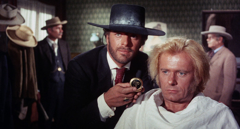 Sartana taunts Lasky (William Berger)