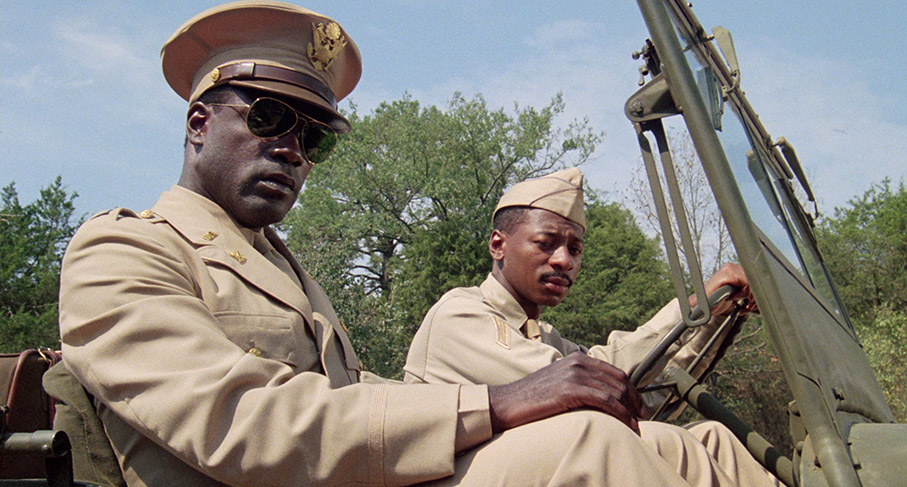 Davenport looks at the murder site with his driver, Private Ellis