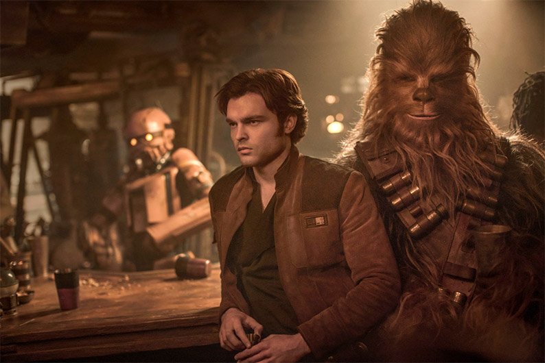 Alden Ehrenreich as Han Solo and Joonas Suotamo as Chewbacca