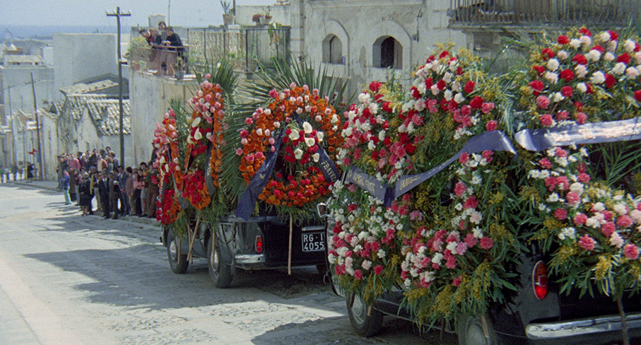 A daylight funeral procession showcases the transfer at its best