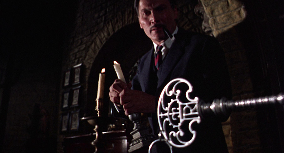 Wyatt (Jack palance) prepares to unlock a secret