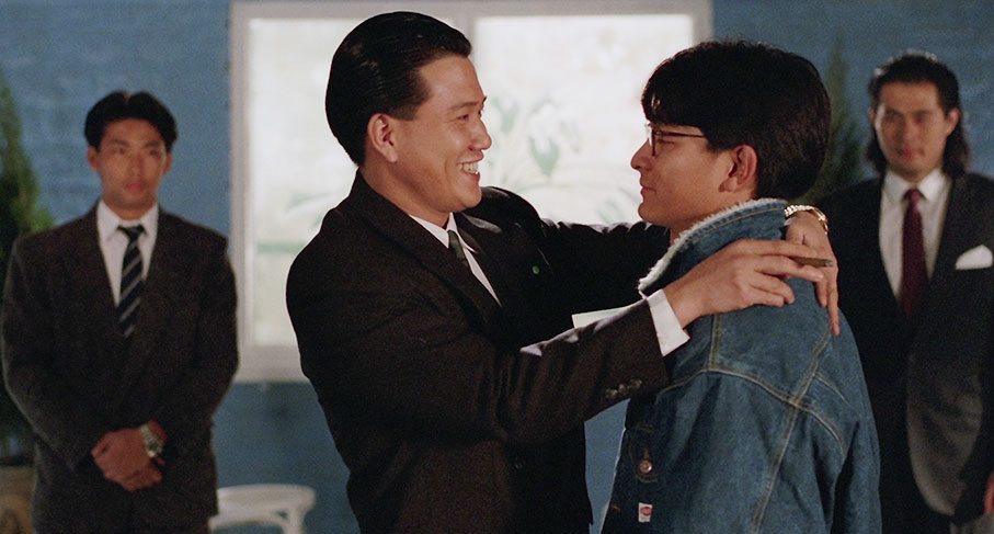 Kar-yung, now a gang boss, welcomes his brother Ting-kwok after first humiliating him in front of his men
