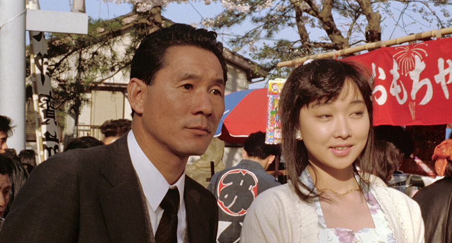 Uehara visits a fair with his sister Akari in Violent Cop