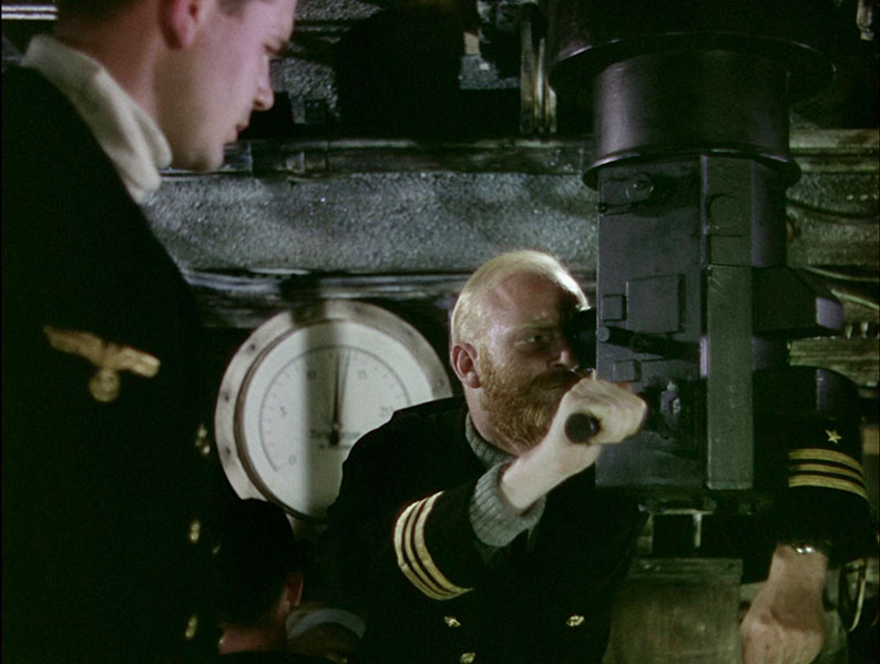 A German submarine crew scope their target